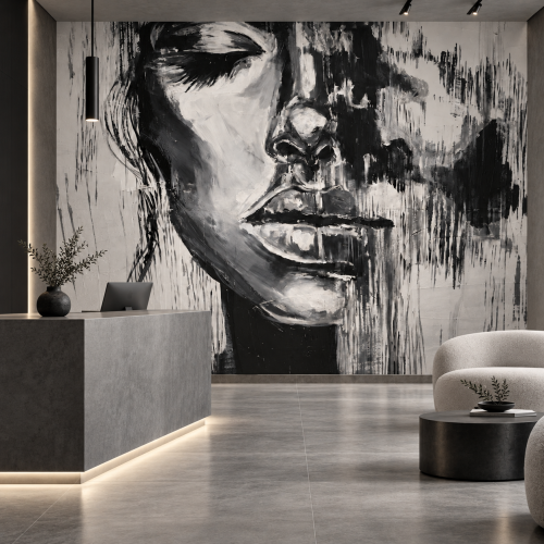 Monochromatyczne lobby z muralem twarzy.png