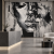 Monochromatyczne lobby z muralem twarzy.png